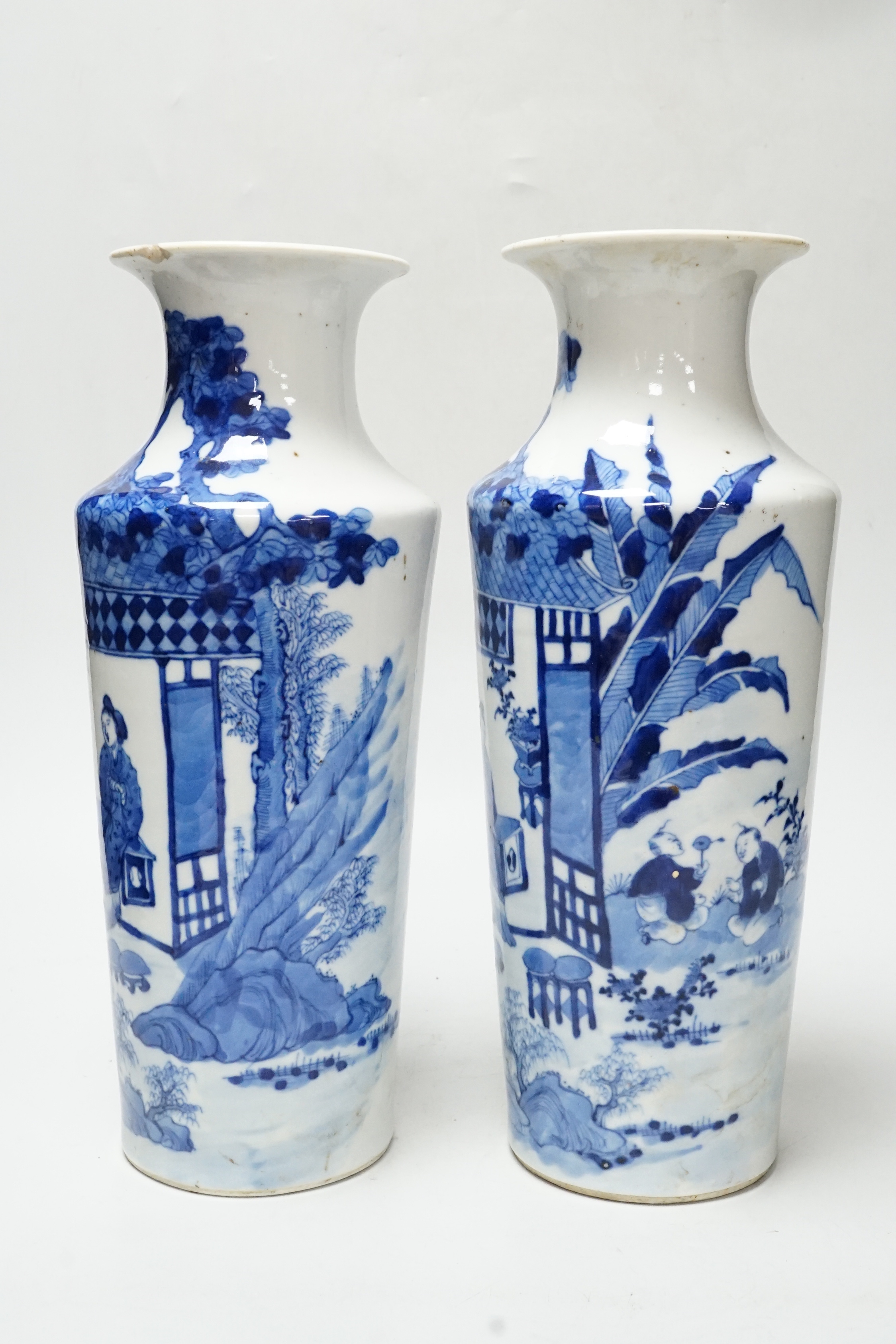 A pair of late 19th century Chinese blue and white vases, 31cm